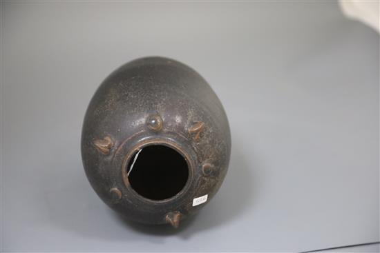 A Chinese Henan dark brown glazed jar, Song-Yuan dynasty, H. 23cm